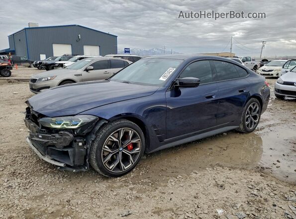 WBA13AW07NFM66194 2022 BMW M4 Blue Առջևի ձախ երեք քառորդ տեսարան