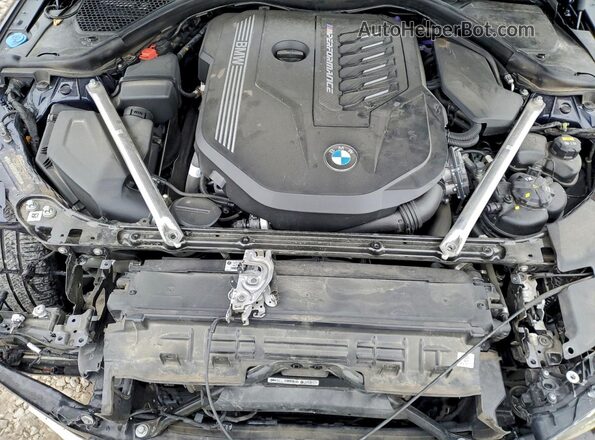 WBA13AW07NFM66194 2022 BMW M4 Blue Սալոնի հետևի տեսք