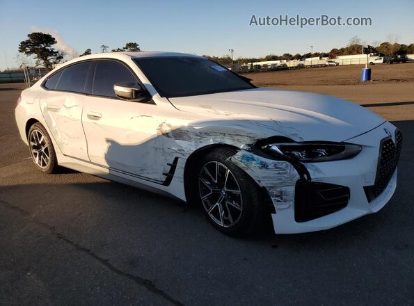 WBA13AW0XNFM70501 2022 BMW M4 White Front right