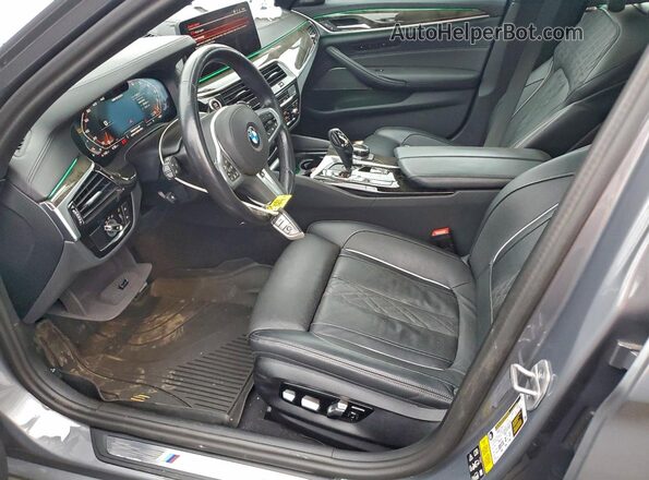 WBA13BK06PCM91779 2023 BMW M5 Gray Widok wnętrza z przodu