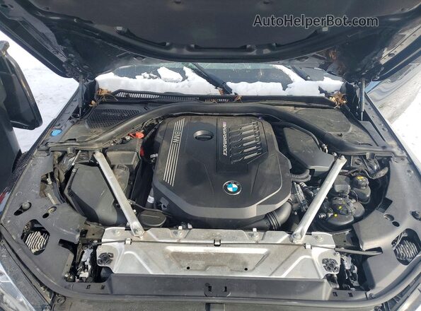 WBA53AT0XMCG85529 2021 BMW M4 Black Engine compartment view