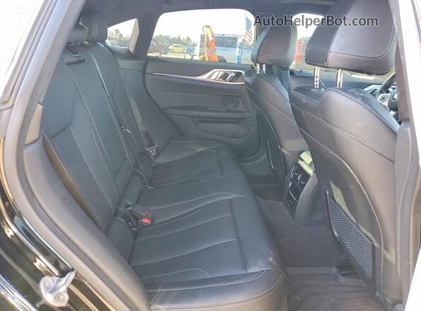 WBA63AV03NFM75305 2022 BMW OTHER Black Հետևի նստատեղերի տեսք