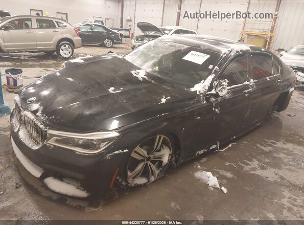 WBA7F2C30HG423191 2017 BMW OTHER Black Front left