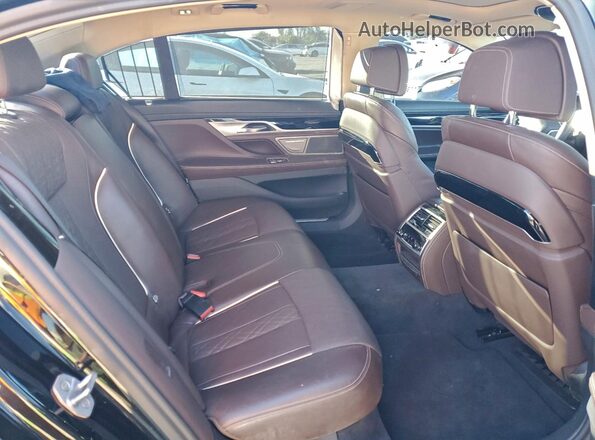 WBA7U2C1XMCF75598 2021 BMW OTHER Black Vista de los asientos traseros