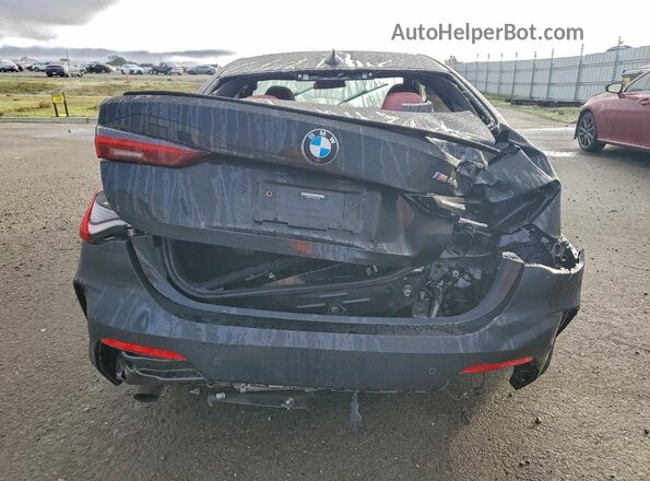 WBA83AP09PCL45586 2023 BMW M4 Black Rear view