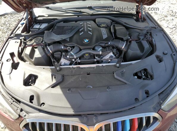 WBABC4C04LCE77570 2020 BMW M8 Maroon Rear interior view