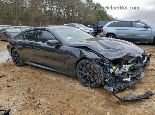 WBAGV8C04NCH67611 2022 BMW M8 Черный Передняя правая четверть