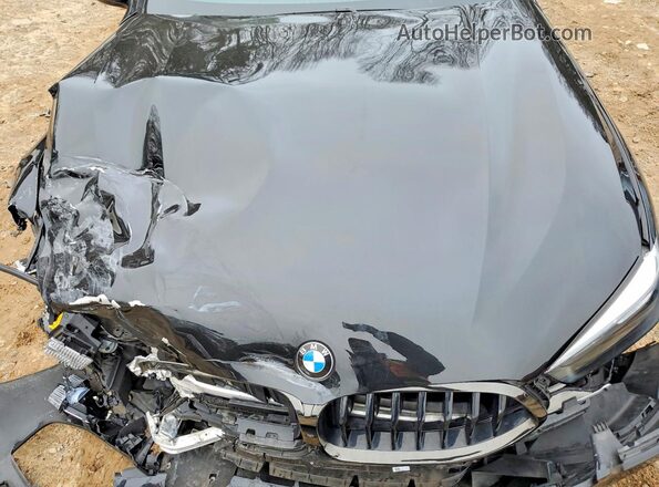 WBAGV8C04NCH67611 2022 BMW M8 Черный Вид задней части салона