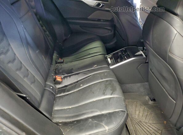 WBAGV8C06NCH89965 2022 BMW M8 Черный Вид задних сидений
