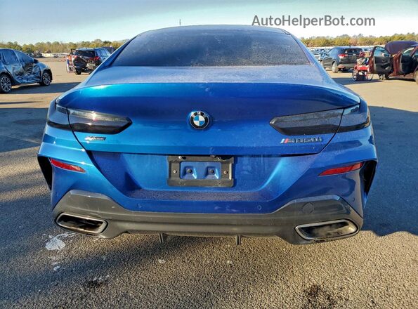 WBAGV8C07LCE44957 2020 BMW M8 Blue Вид ззаду