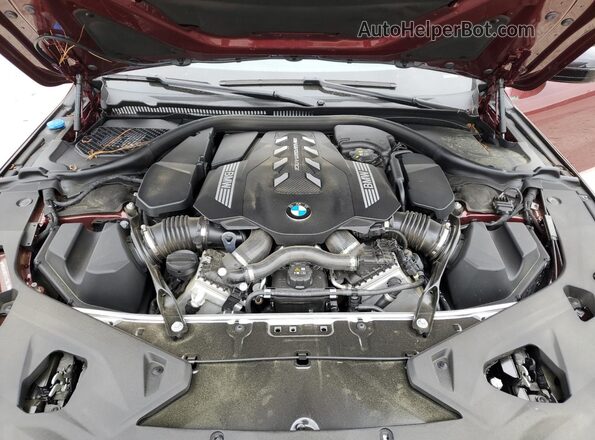 WBAGV8C0XSCT85219 2025 BMW M8 Бордовый Вид задней части салона