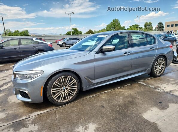 WBAJB9C56JB035431 2018 BMW M5 Серый Передняя левая четверть