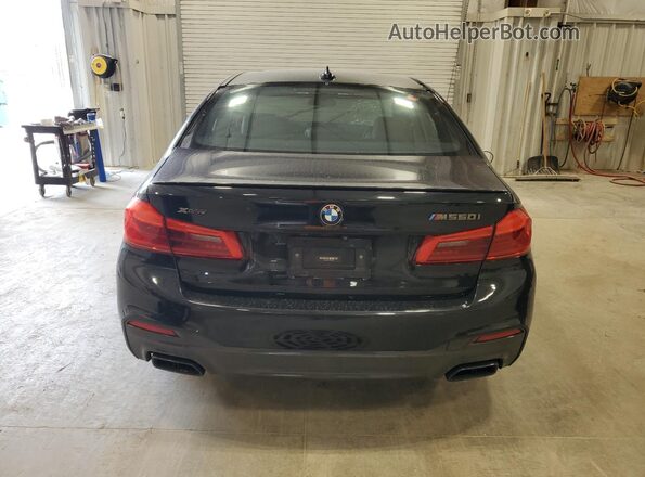 WBAJS7C09LBN96055 2020 BMW M5 Black Widok z tyłu