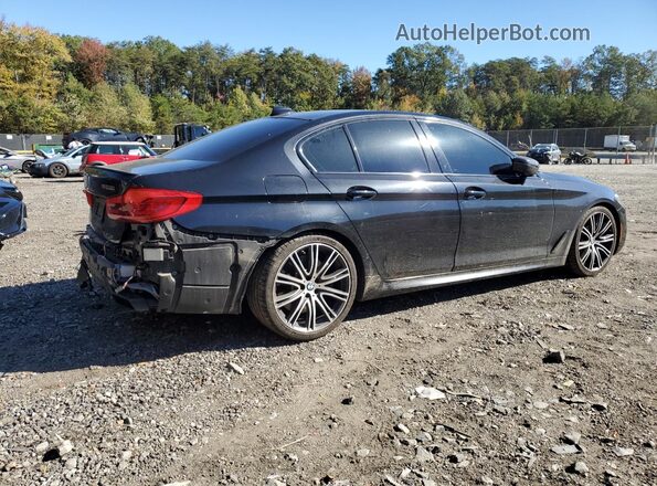 WBAJS7C09LBN96671 2020 BMW M5 Black Tył prawy