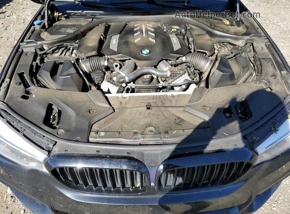 WBAJS7C09LBN96671 2020 BMW M5 Black Widok wnętrza z tyłu