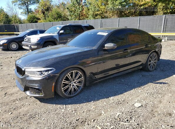 WBAJS7C09LBN96671 2020 BMW M5 Black Przód lewy