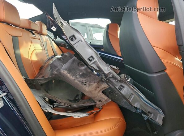 WBS83CH04PCN22583 2023 BMW M5 Синий Вид задних сидений