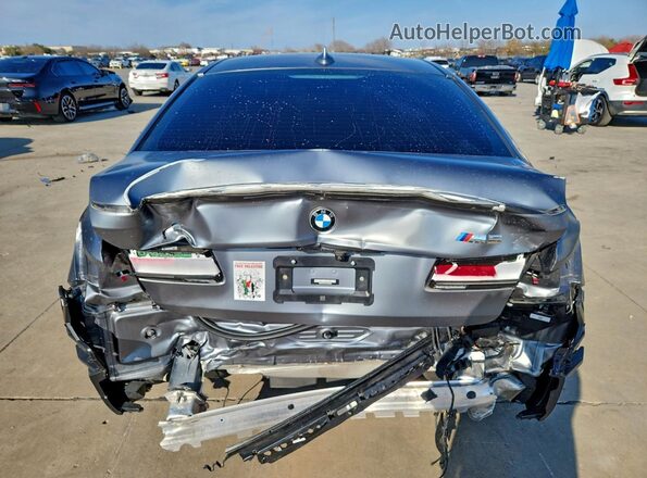 WBS83CH07NCJ03334 2022 BMW M5 Silver Widok z tyłu