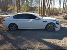 2016 Bmw M5   White vin: WBSFV9C52GD595775