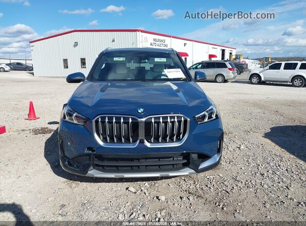 WBX73EF03T5488140 2026 BMW X1 Blue Widok zestawu wskaźników