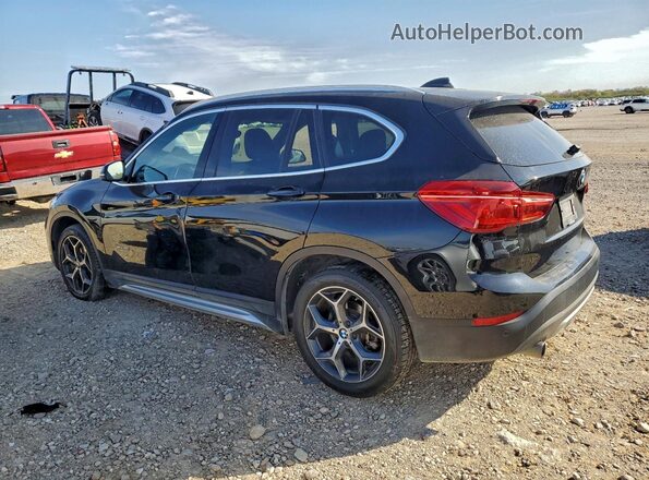 WBXHT3C30GP881823 2016 BMW X1 Black Rear left