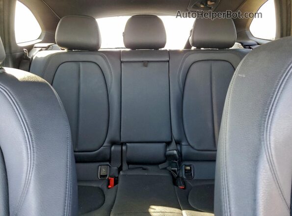 WBXHT3C30GP881823 2016 BMW X1 Black Rear seats view