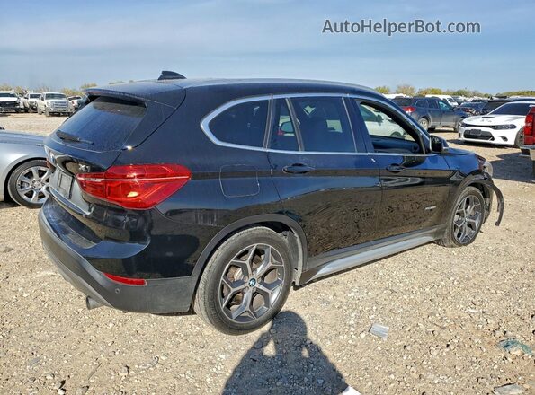 WBXHT3C30GP881823 2016 BMW X1 Black Rear right