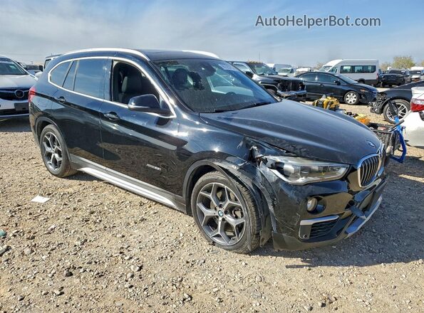 WBXHT3C30GP881823 2016 BMW X1 Black Front right