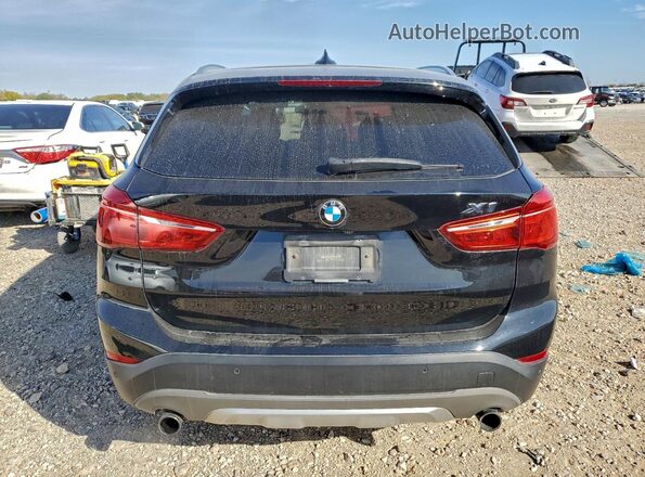 WBXHT3C30GP881823 2016 BMW X1 Black Rear view