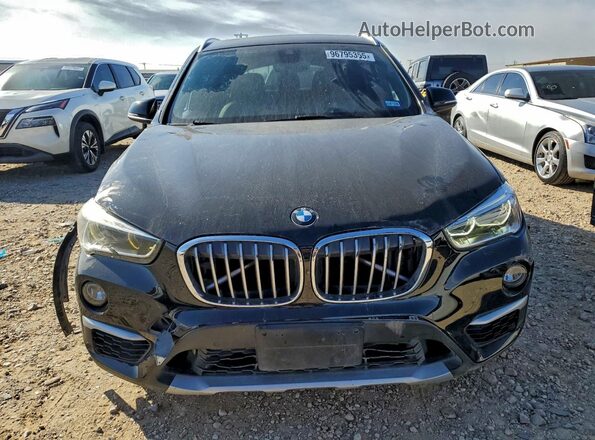 WBXHT3C30GP881823 2016 BMW X1 Black Front view
