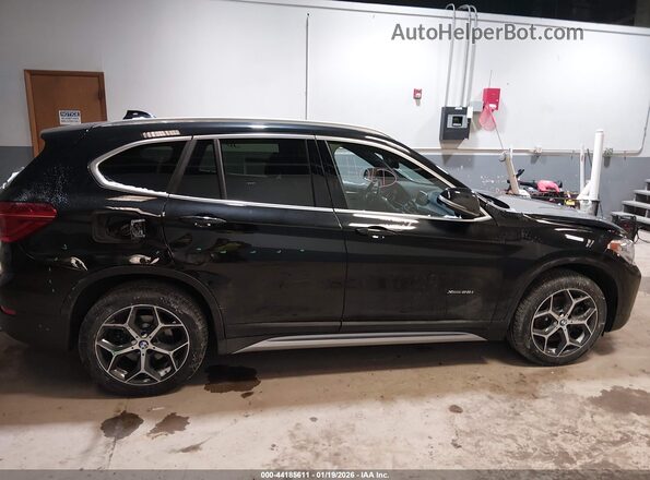 WBXHT3C32J5L24995 2018 BMW X1 Black Widok wnętrza z tyłu