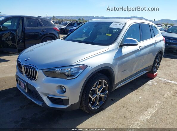 WBXHT3C33GP884814 2016 BMW X1 Silver Przód lewy