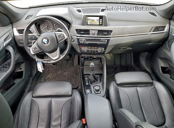 WBXHT3C35GP889030 2016 BMW X1 Black Widok deski rozdzielczej