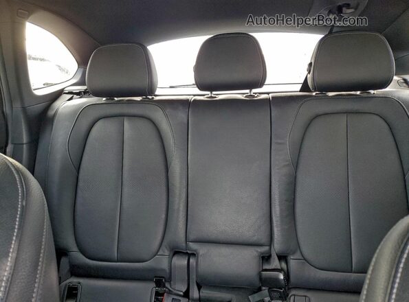 WBXHT3C35GP889030 2016 BMW X1 Black Widok tylnych siedzeń