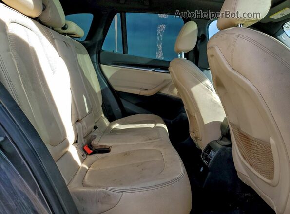 WBXHT3C36G5E48828 2016 BMW X1 Gray Widok wnętrza z tyłu