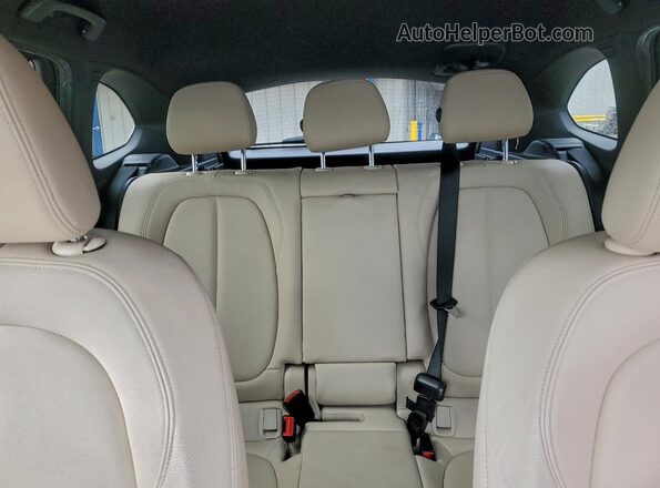 WBXHT3C37G5E54069 2016 BMW X1 White Вид задніх сидінь