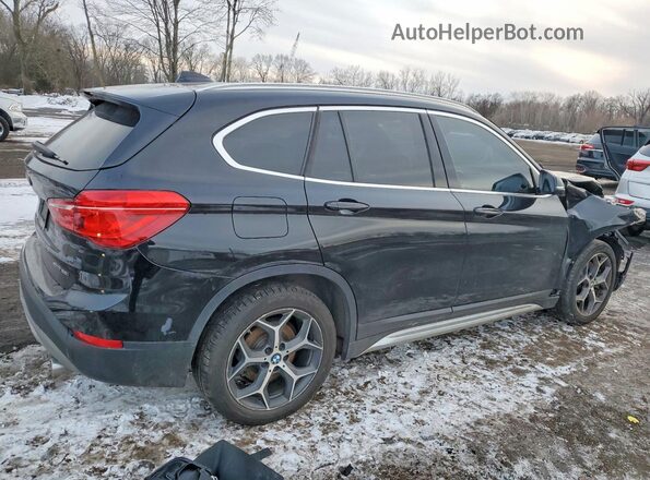WBXHT3C38J5L27965 2018 BMW X1 Black Trasero derecho