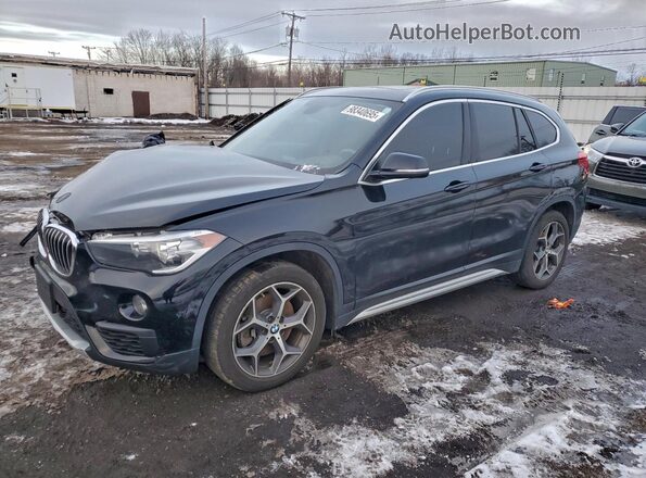 WBXHT3C38J5L27965 2018 BMW X1 Black Vista tres cuartos delantera izquierda