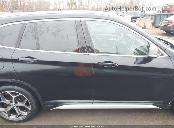 WBXHT3C38J5L34785 2018 BMW X1 Black Widok wnętrza z tyłu