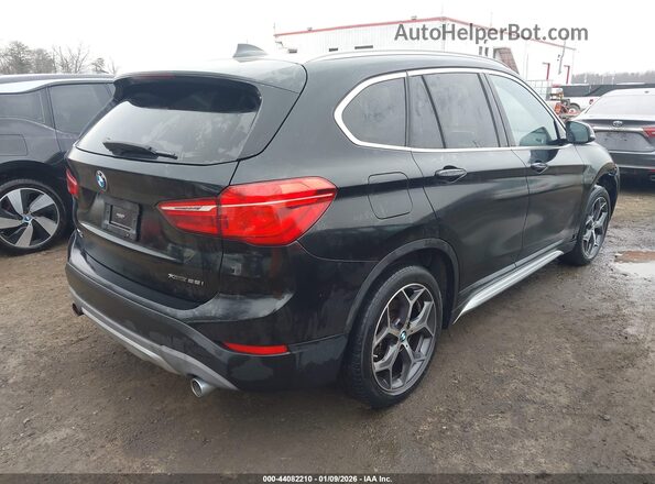 WBXHT3C38J5L34785 2018 BMW X1 Black Tył prawy