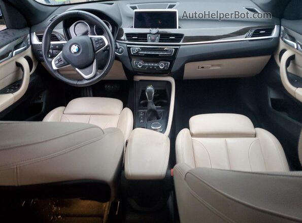 WBXHT3C39J5L27831 2018 BMW X1 Черный Вид панели приборов