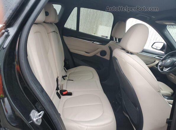 WBXHT3C39J5L27831 2018 BMW X1 Черный Вид задней части салона