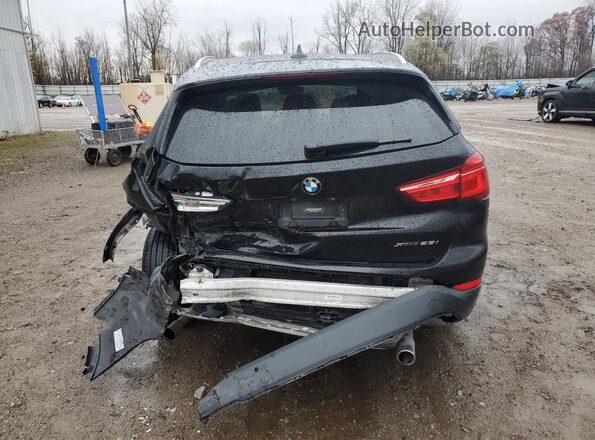 WBXHT3C39J5L27831 2018 BMW X1 Черный Вид сзади