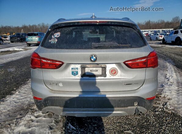 WBXHT3C53K5L38455 2019 BMW X1 Серебряный Вид сзади
