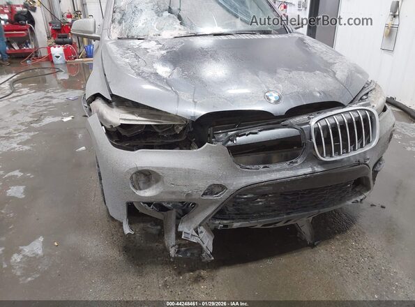 WBXHT3Z36G4A49933 2016 BMW X1 Gray Widok z przodu