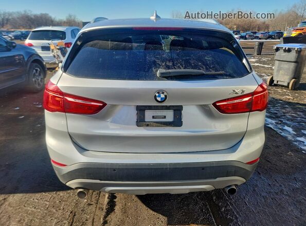 WBXHT3Z37H4A65284 2017 BMW X1 Silver Widok z tyłu