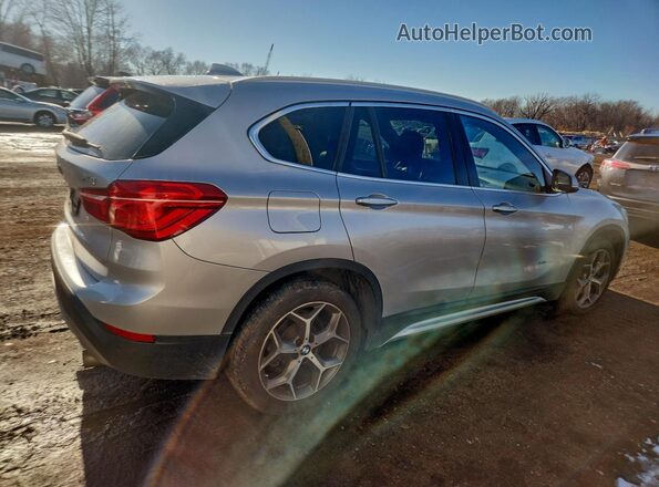 WBXHT3Z37H4A65284 2017 BMW X1 Silver Tył prawy
