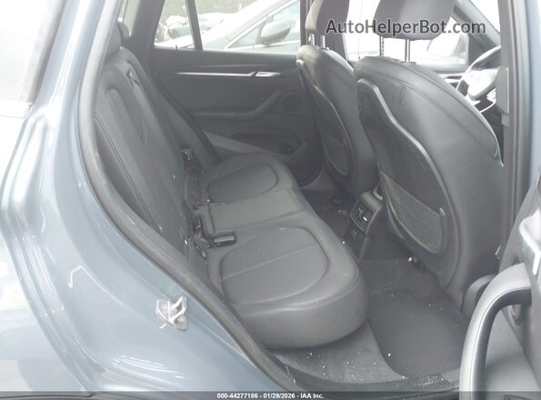 WBXJG7C07L3L85650 2020 BMW X1 Gray Вид наклейки з VIN-кодом