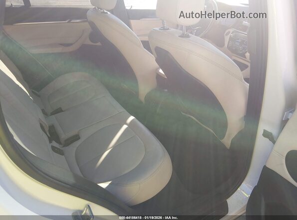 WBXJG9C06L5P69080 2020 BMW X1 White Vista de la etiqueta del VIN