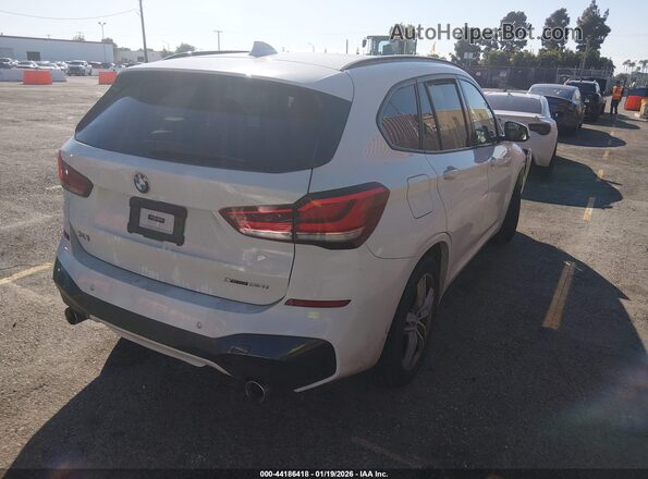 WBXJG9C06L5P69080 2020 BMW X1 White Trasero derecho